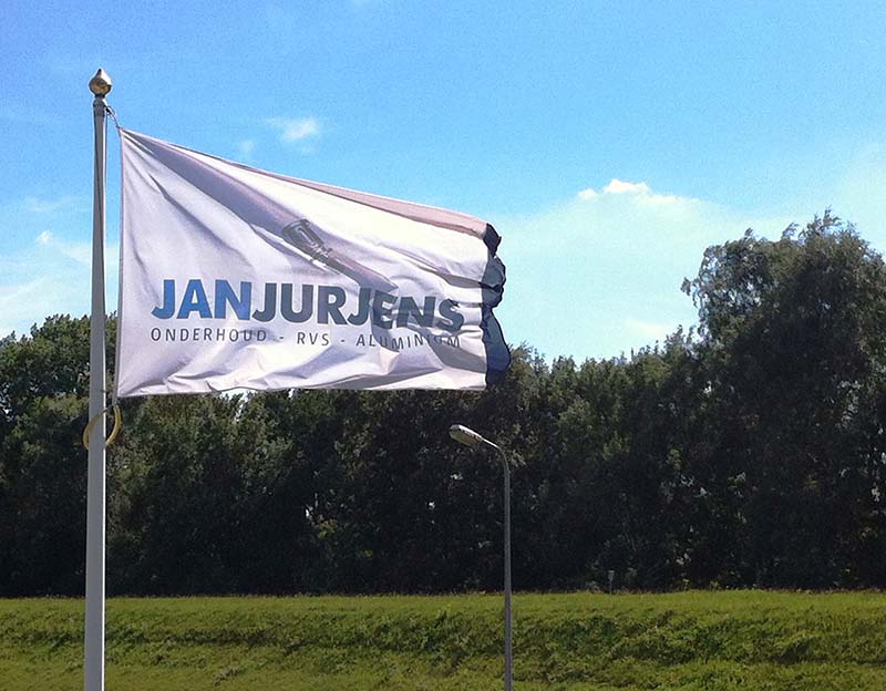 Jan Jurjens vlag-met-nieuw-logo